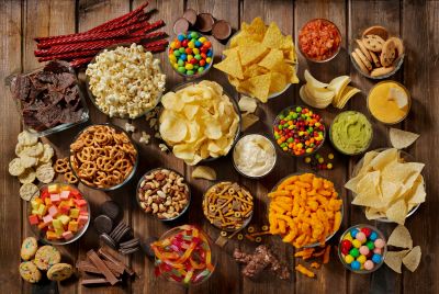 Image of a large variety of junk foods, illustrating that binge eating disorder can become life-threating if not treated.